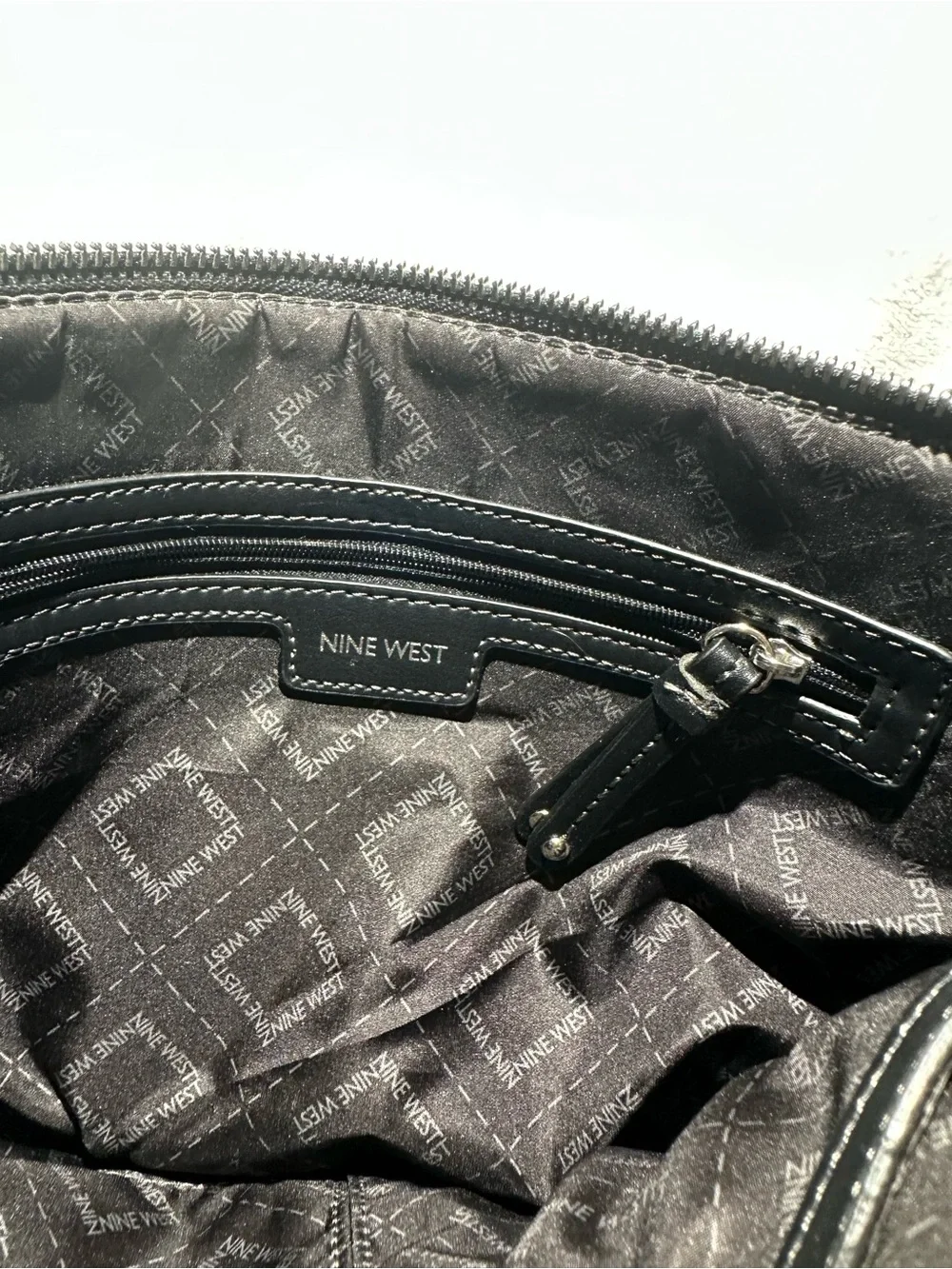 Nine West Black Leather Crossbody with Silver Eyelet Accents